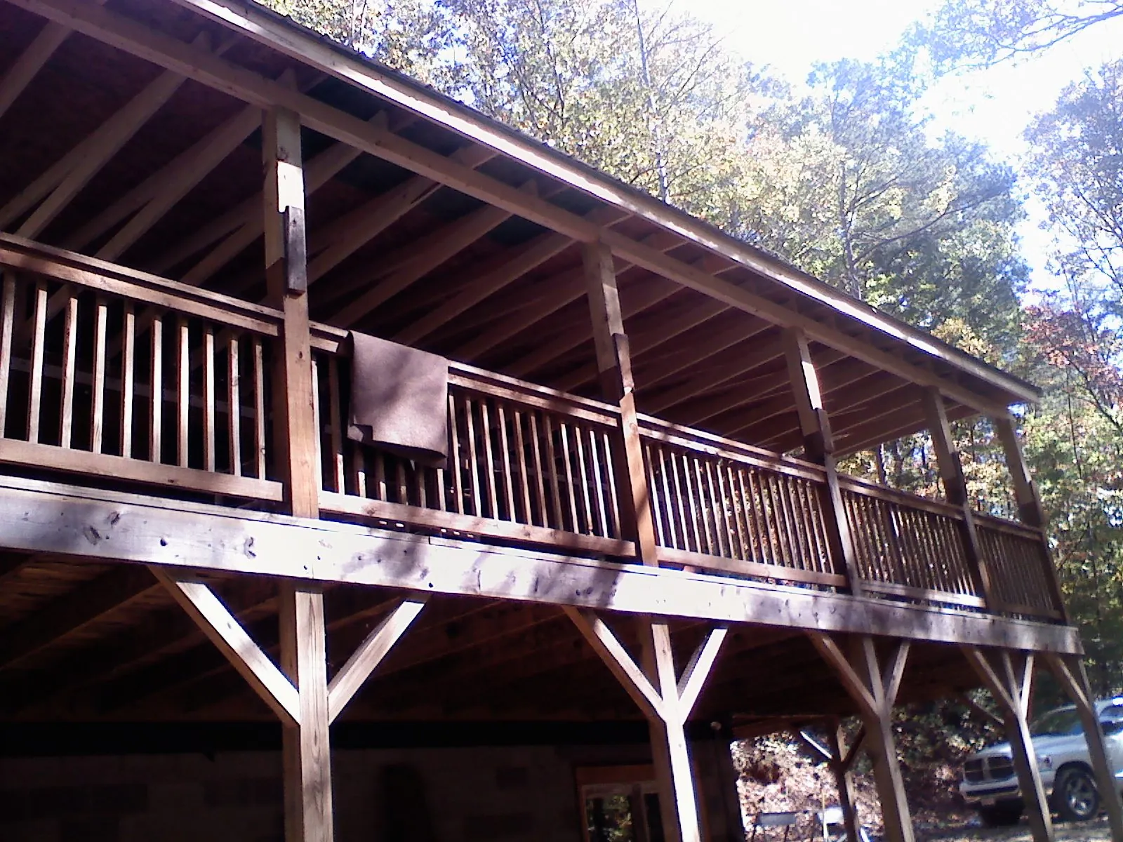 Timber framing under a new elevated porch and deck — Roof Leak Repair in Brownsdale by Roofing Brothers